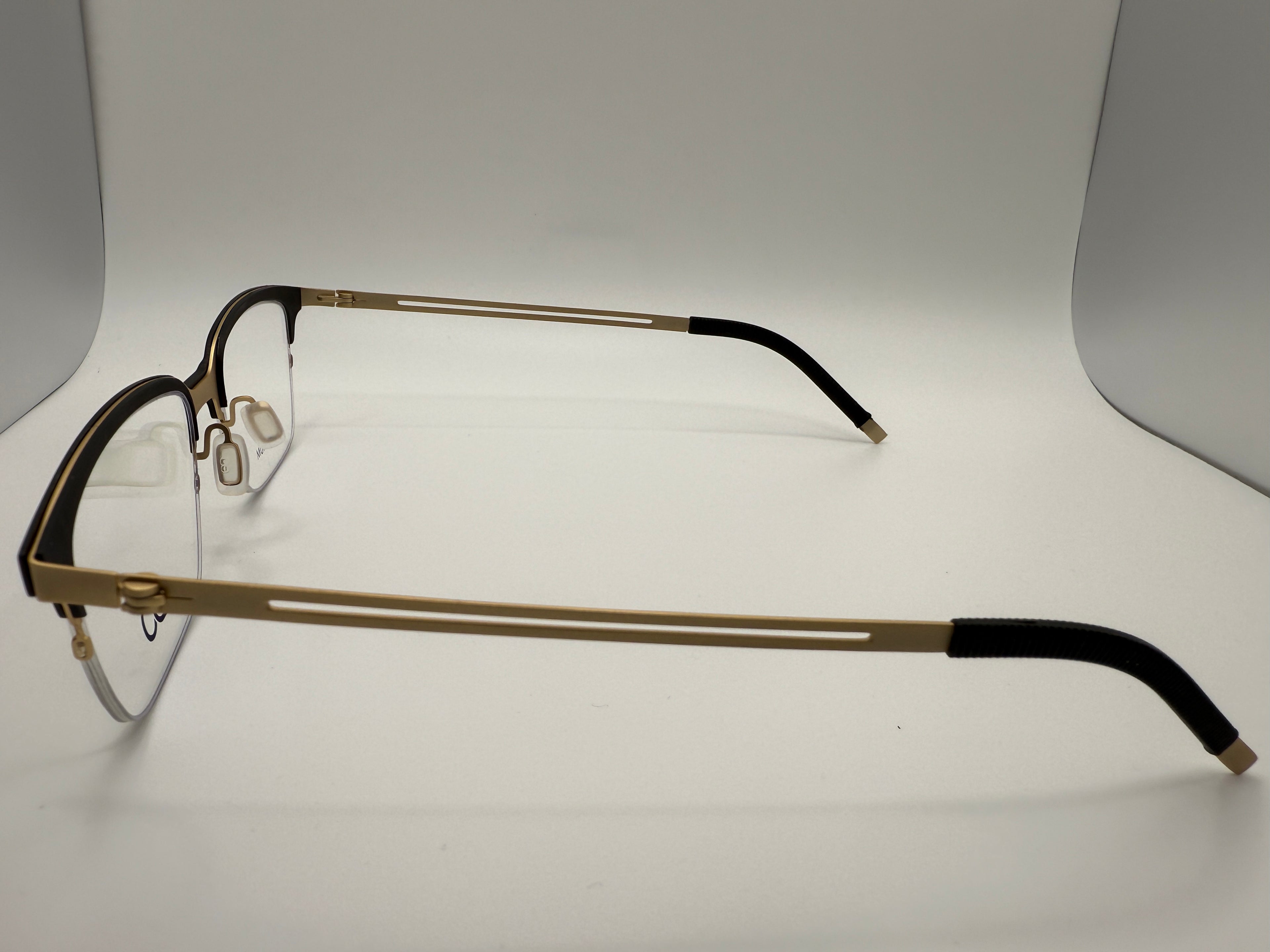 NOT24064(LJ6306) Men style; Titanium with TR rim ,rubber tips.